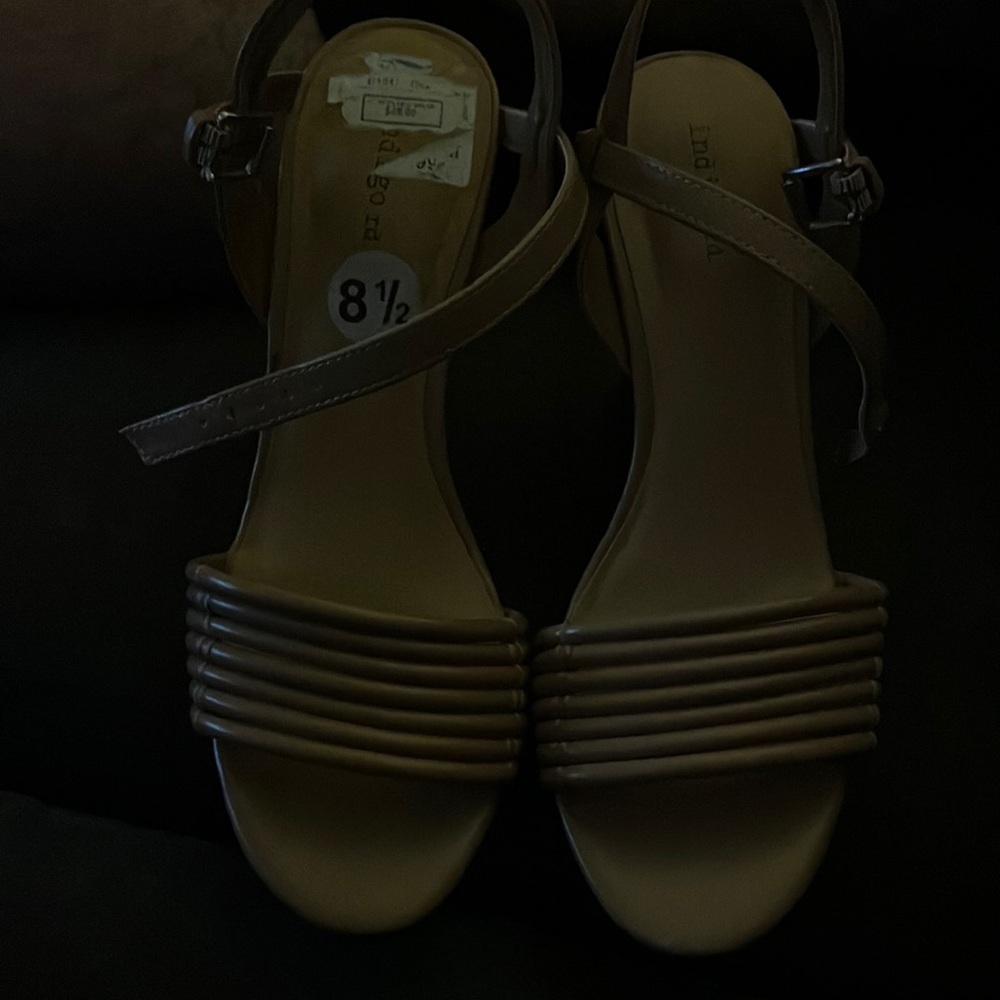 A pair of light brown wedges size 81/2. Perfect fitting strap around the ankle. - Picture 1 of 10